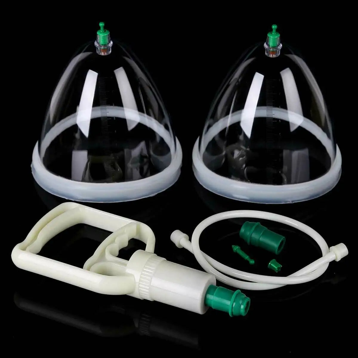 Pompe de massage avec ventouses sur fond noir