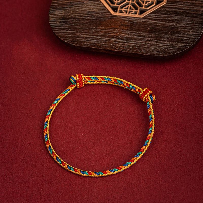 Bracelet Tibétain  à cordes rouges pour la Protection