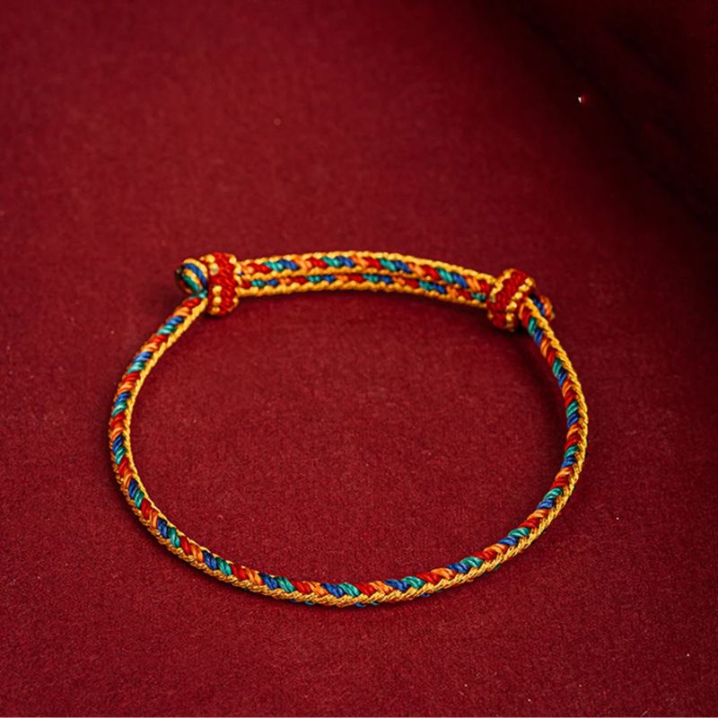 Bracelet Tibétain  à cordes rouges pour la Protection