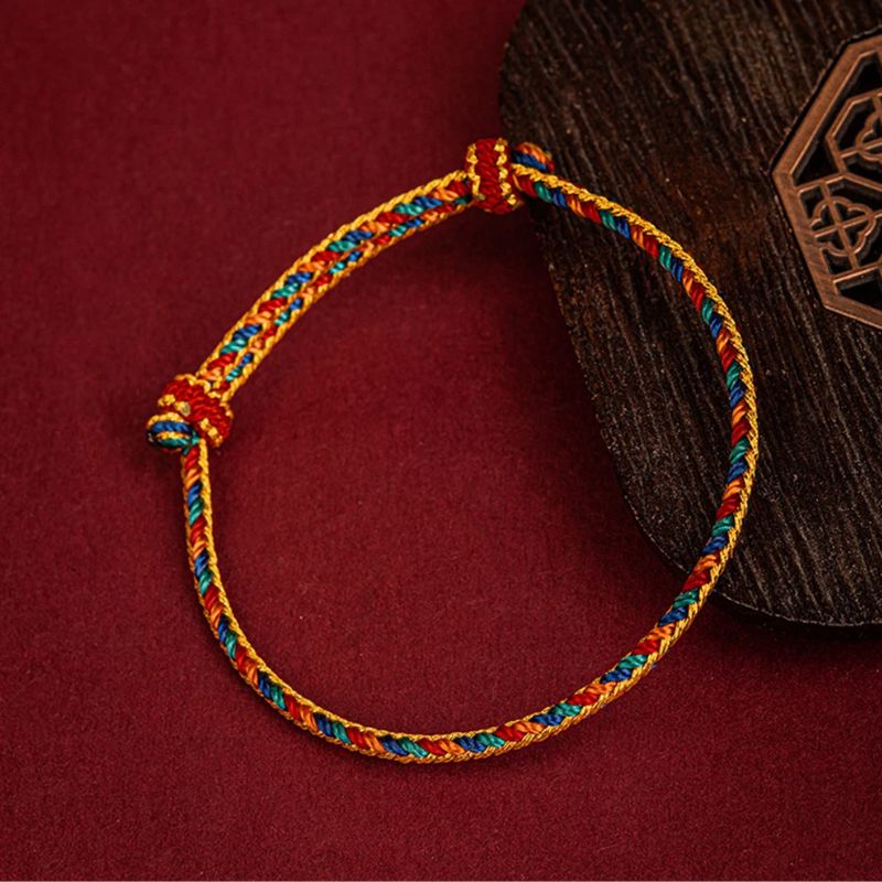 Bracelet Tibétain  à cordes rouges pour la Protection