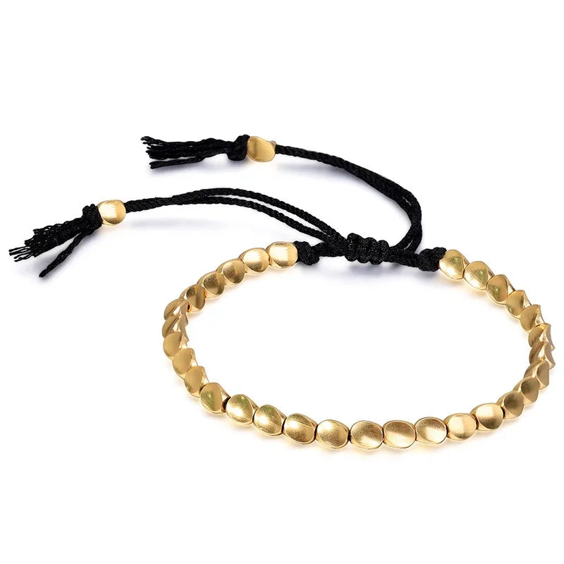Bracelet tibétain perles de cuivre et Cordon Noir