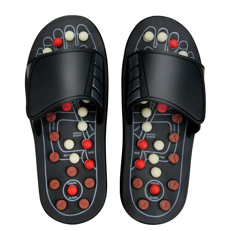 Pantoufles d'acupression noires et massantes
