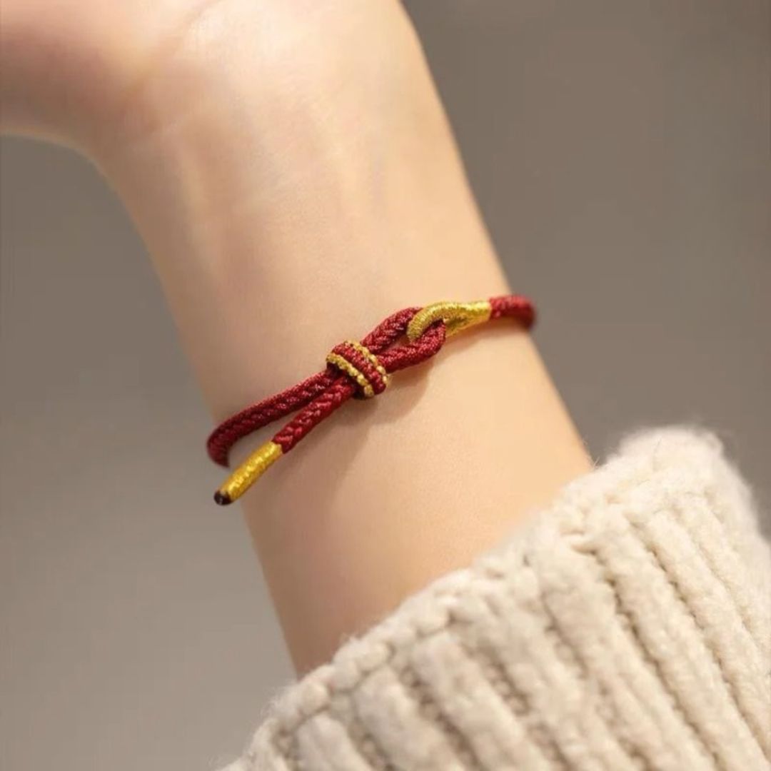 Bracelet rouge et doré en coton