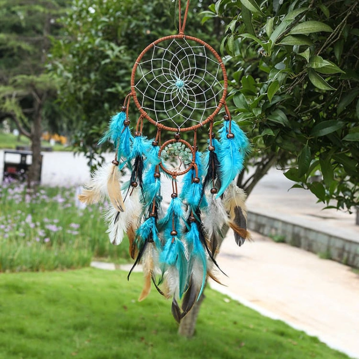 Attrape rêves double plumes turquoise