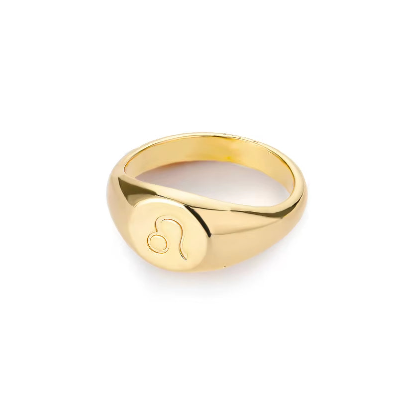 Bague Signe Astrologique Dorée en Cuivre sur fond blanc