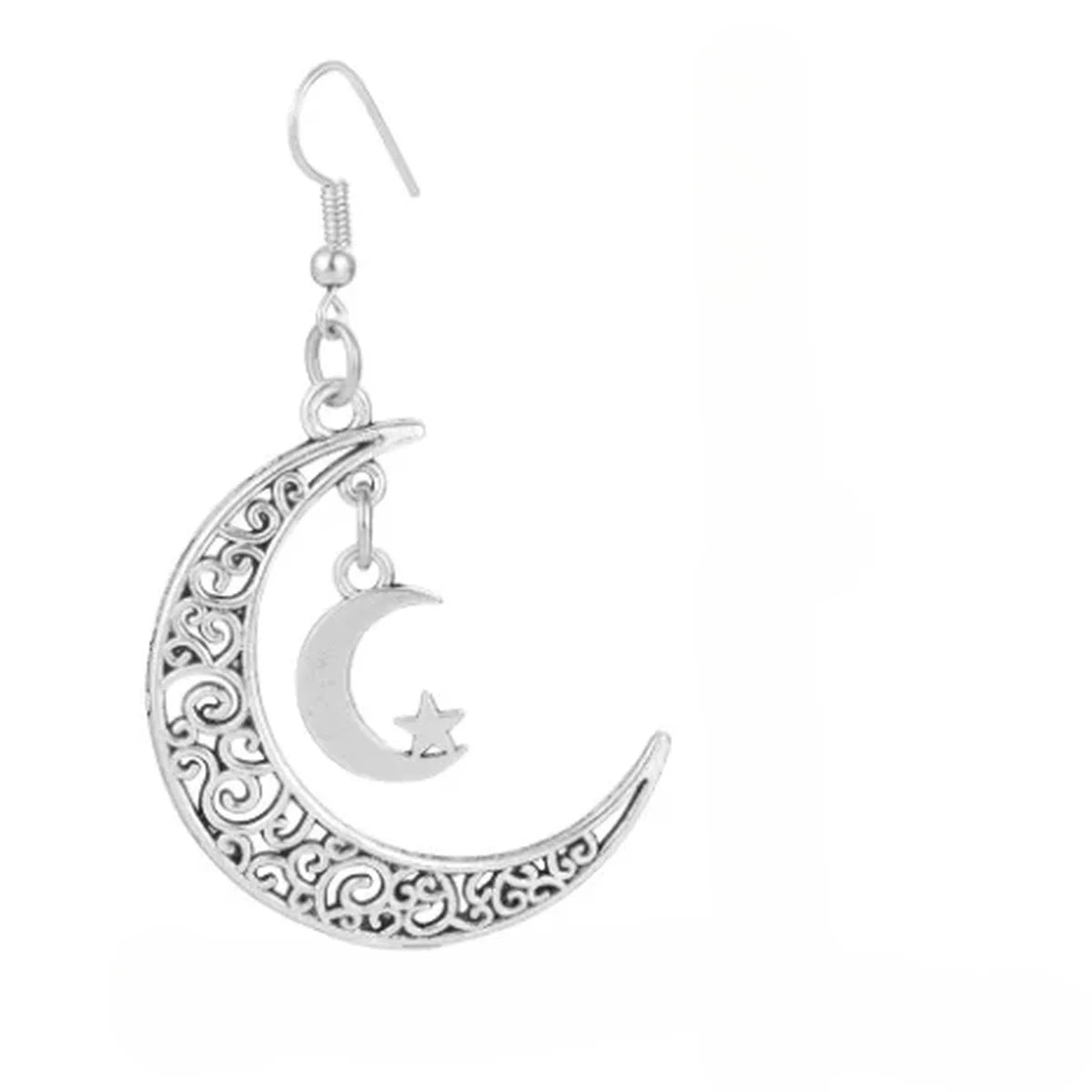 Détail des boucles d'oreilles croissant de lune, filigrane et étoile
