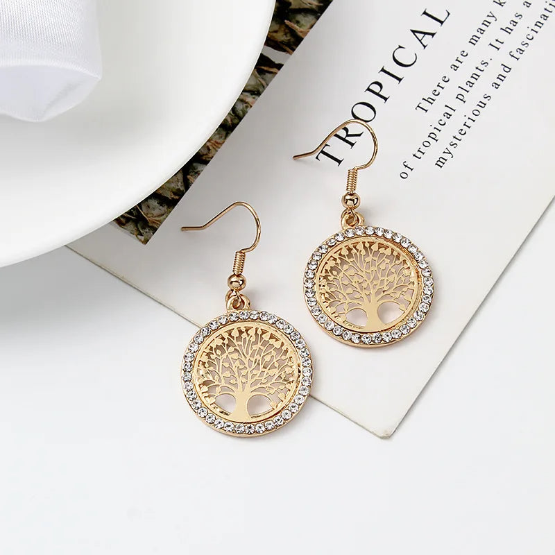 Boucles d'oreilles dorées avec arbre de vie