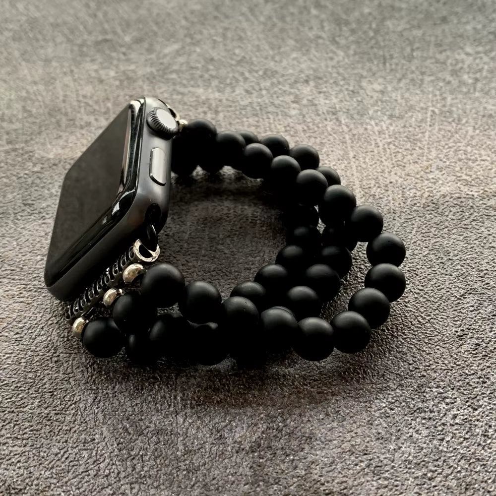 Bracelet Apple Watch avec Perles d’Hématite sur fond gris