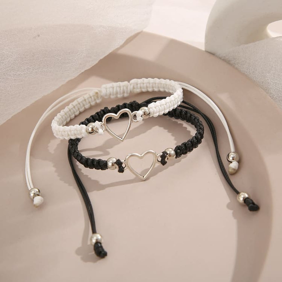 Bracelet de couple en forme de cœur, cordon tressé et cœur métallique