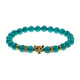 Bracelet léopard bleu turquoise sur fond blanc, vue de face