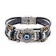 Bracelet multirang noir avec mauvais œil bleu, plaque argentée et fermoir visible