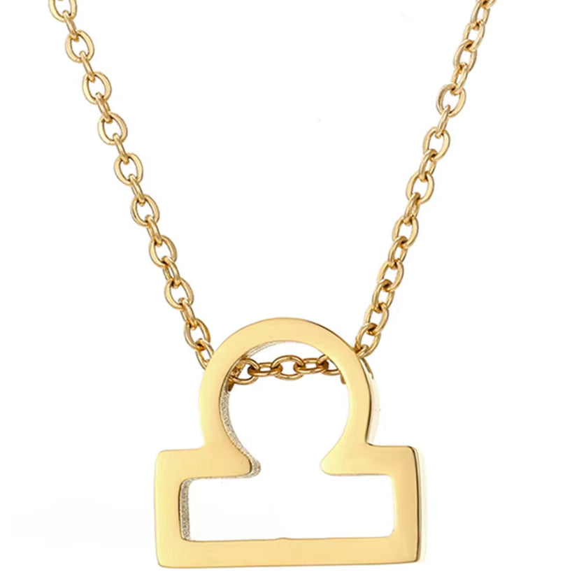 Collier Signe Astrologique Doré et Moderne sur fond blanc