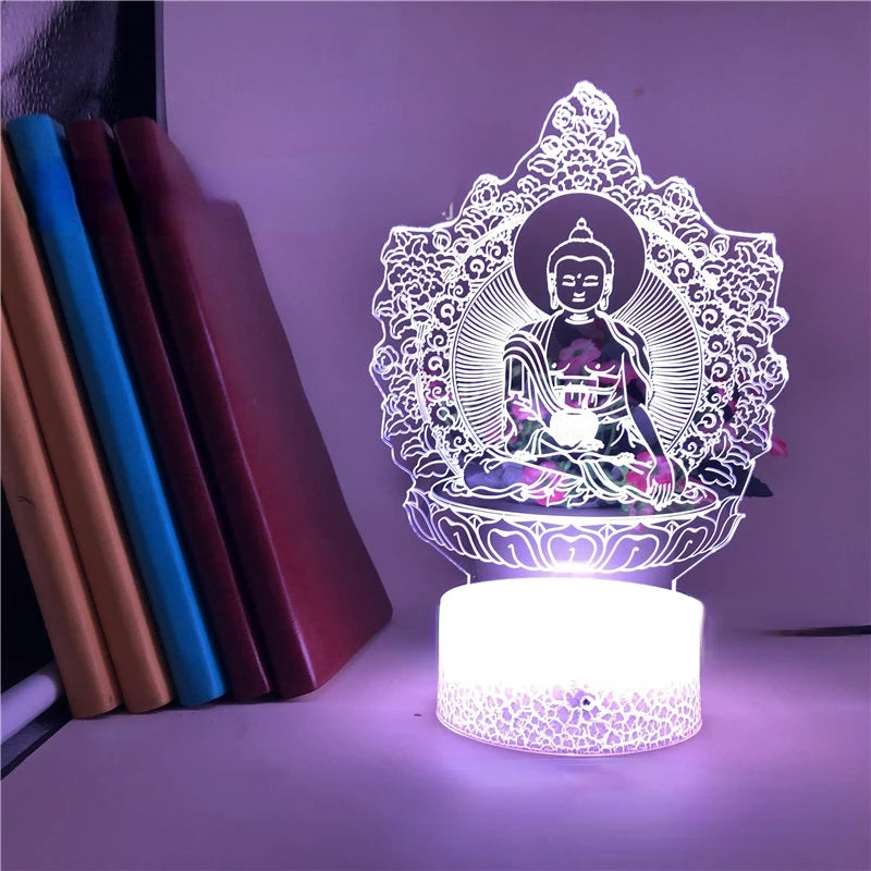 Lampe zen 3D bouddha avec seize couleurs réglables allumée avec des livres à gauche