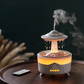 Lampe zen avec humidificateur d'air à gouttes d'eau sur une table marron avec une télécommande sur fond noir