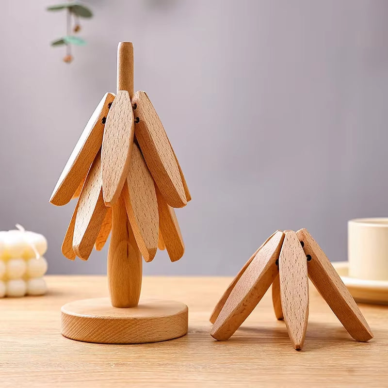 Lot de 3 Dessous de Verre Pliables en Bois sur une table Image