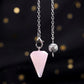 Pendule Triangulaire - Quartz Rose sur fond noir