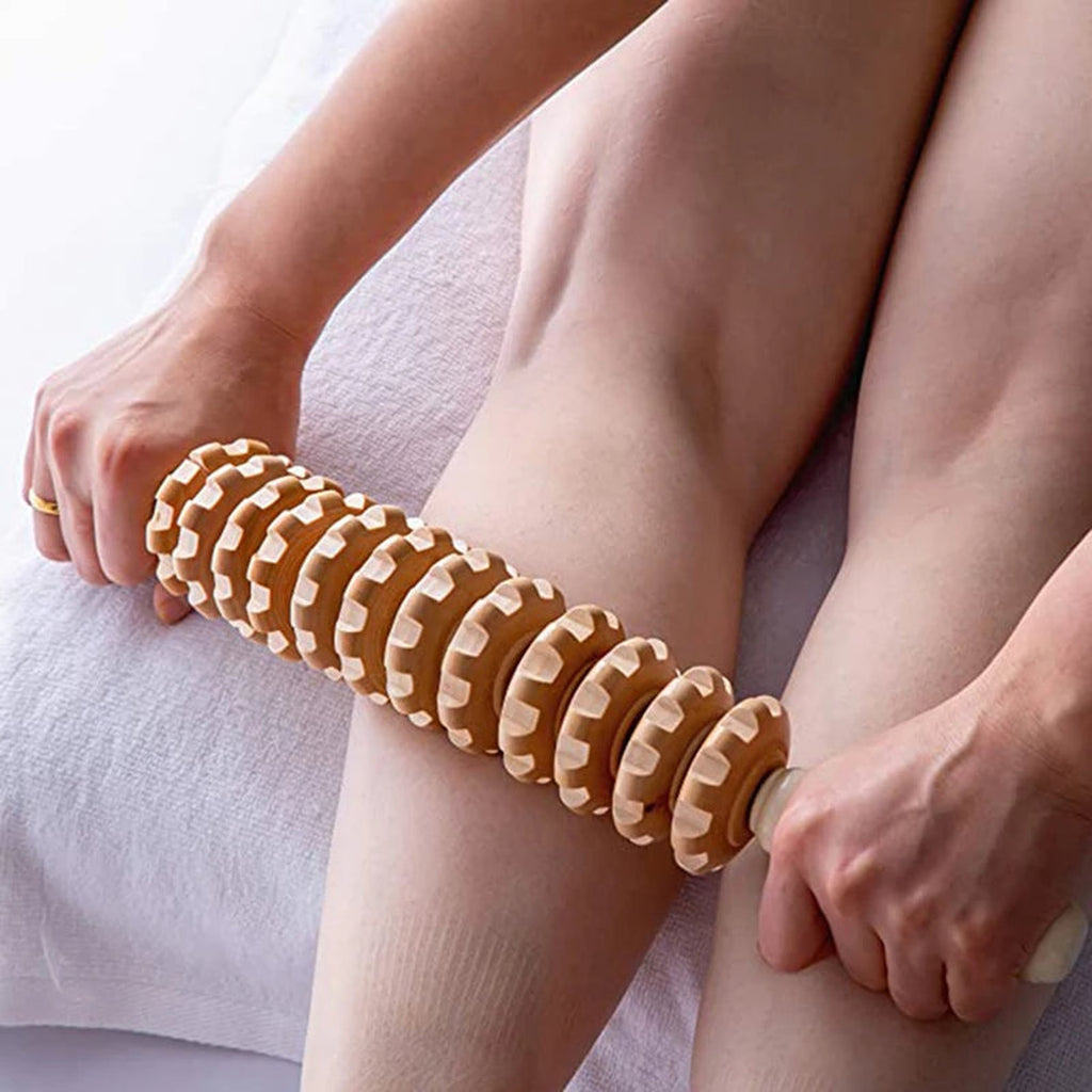 Rouleau de massage à douze disques utilisé sur les jambes
