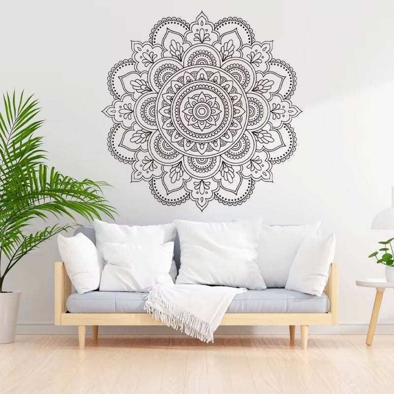Sticker Mural Mandalas – Style Bohème sur un mur avec un canapé en dessous