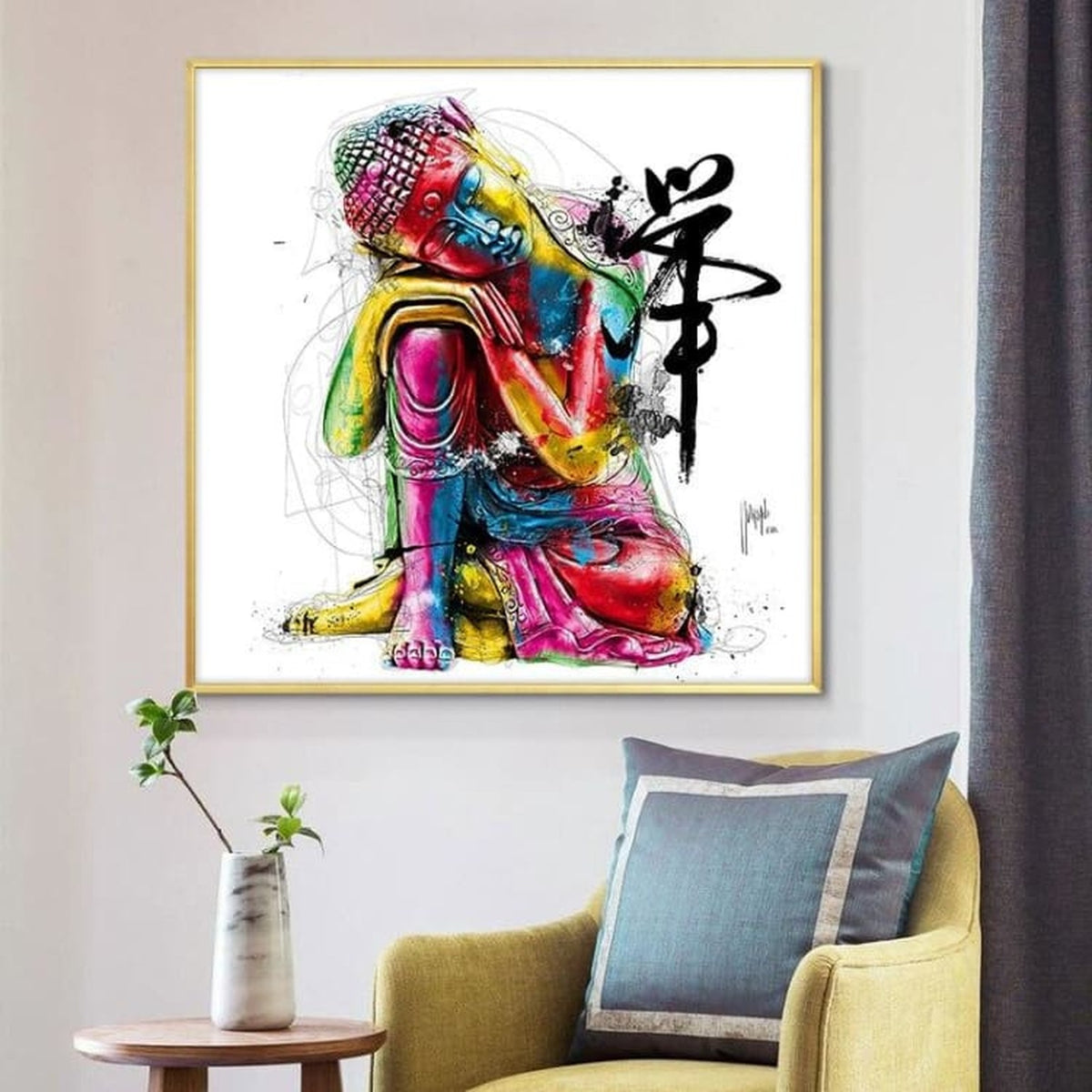 Tableau Bouddha coloré mis en scène au-dessus d’un fauteuil