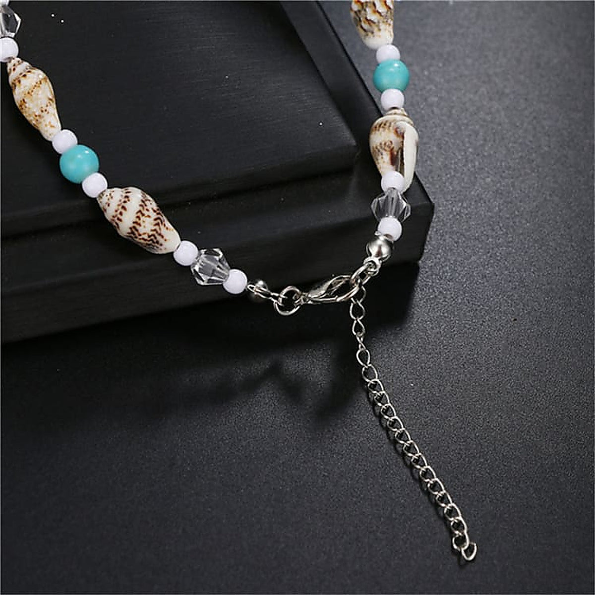 Fermoir mousqueton argenté et chaîne d'extension du bracelet de cheville