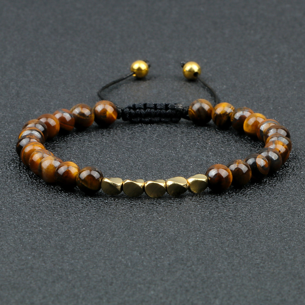 Bracelet œil de tigre tressé en perles de cuivre