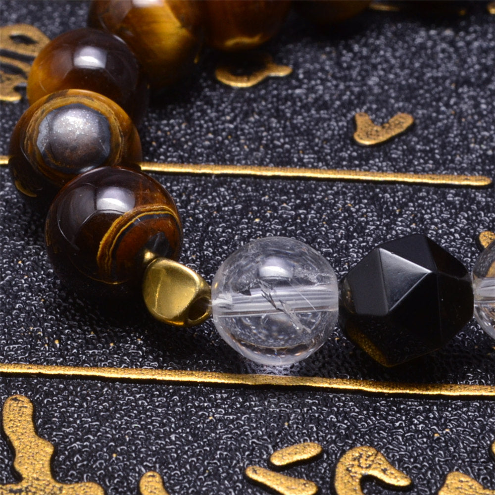 Bracelet œil de tigre avec boule en cristal gravé