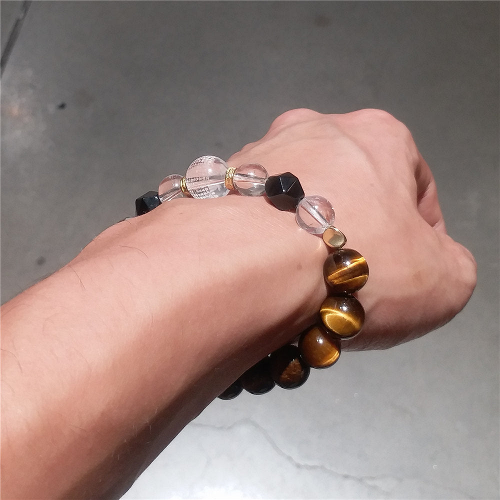 Bracelet œil de tigre avec boule en cristal gravé