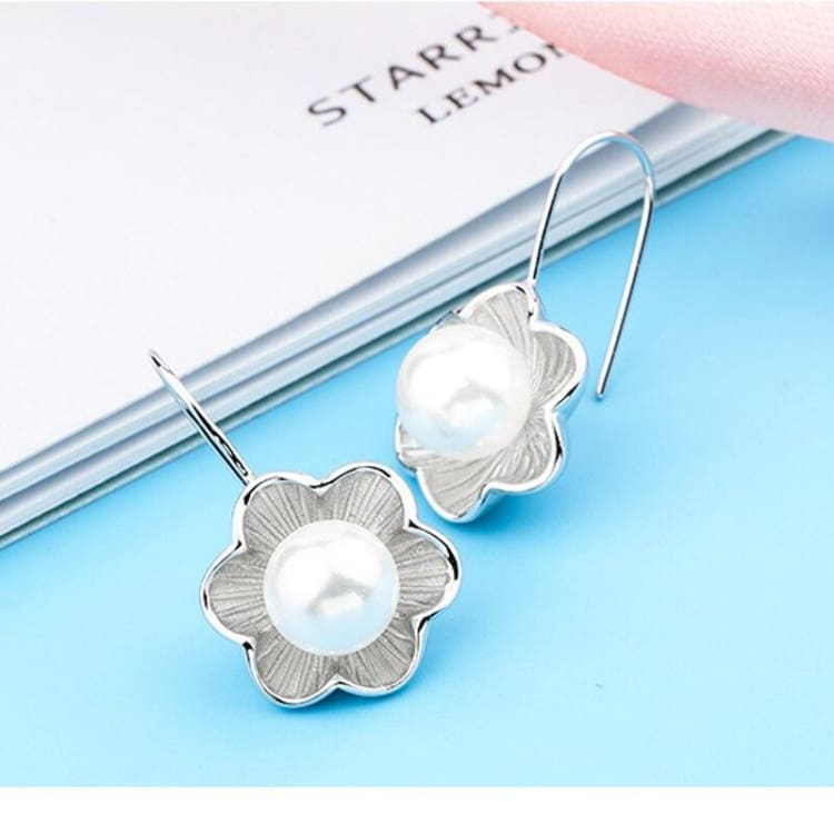 Boucles d’oreilles du Lotus perlé