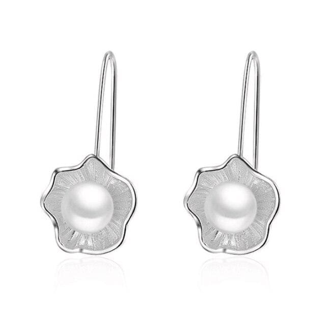 Boucles d’oreilles du Lotus perlé Image