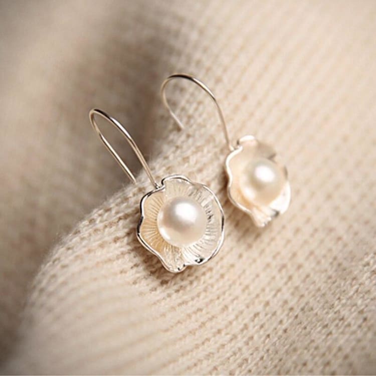 Boucles d’oreilles du Lotus perlé Image