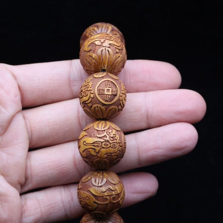 Bracelet des ancêtres en bois de santal doré - bracelet