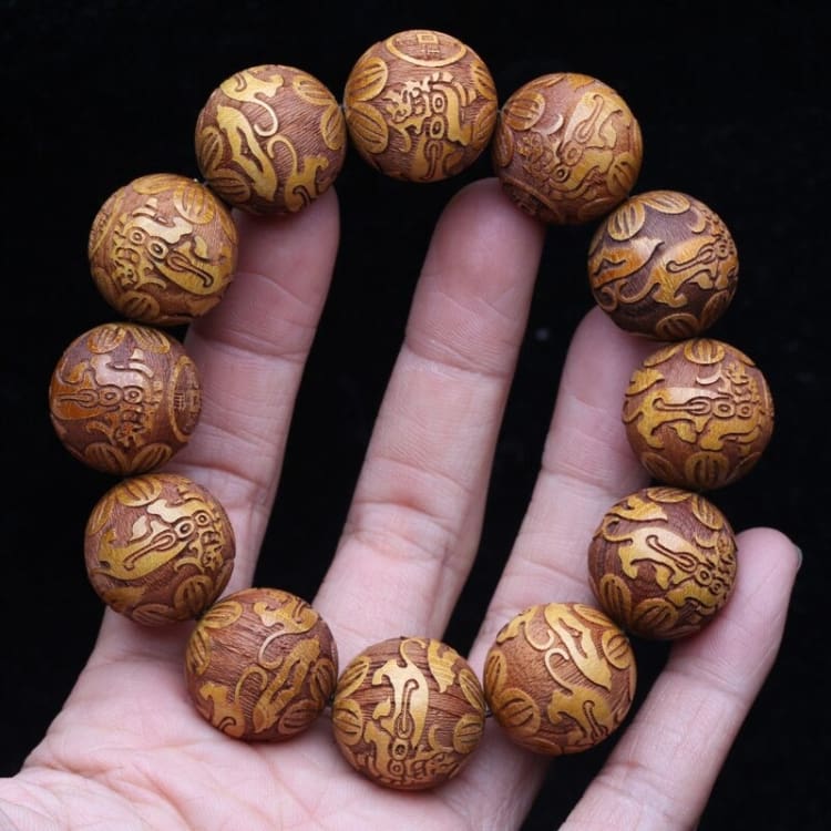 Bracelet des ancêtres en bois de santal doré - bracelet