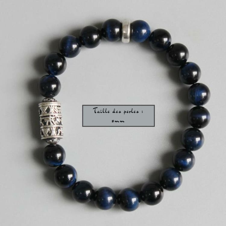 Vue de dessus du bracelet Om, alternance des perles et de la rondelle argentée