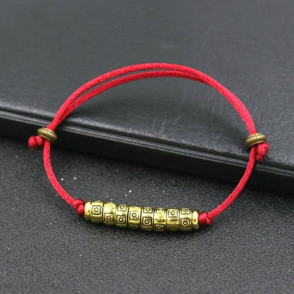 Bracelet ’Roue de prière’ du Tibet - Rouge - Bracelet