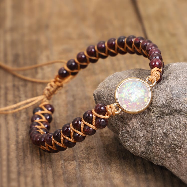 Bracelet tressé en grenat et opale Image